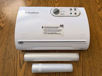FoodSaver food sealer and sealer bags. Like new.