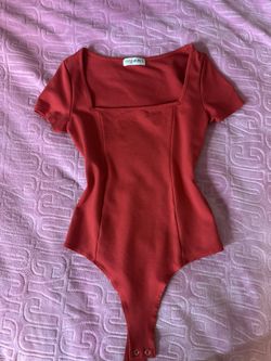 red bodysuit