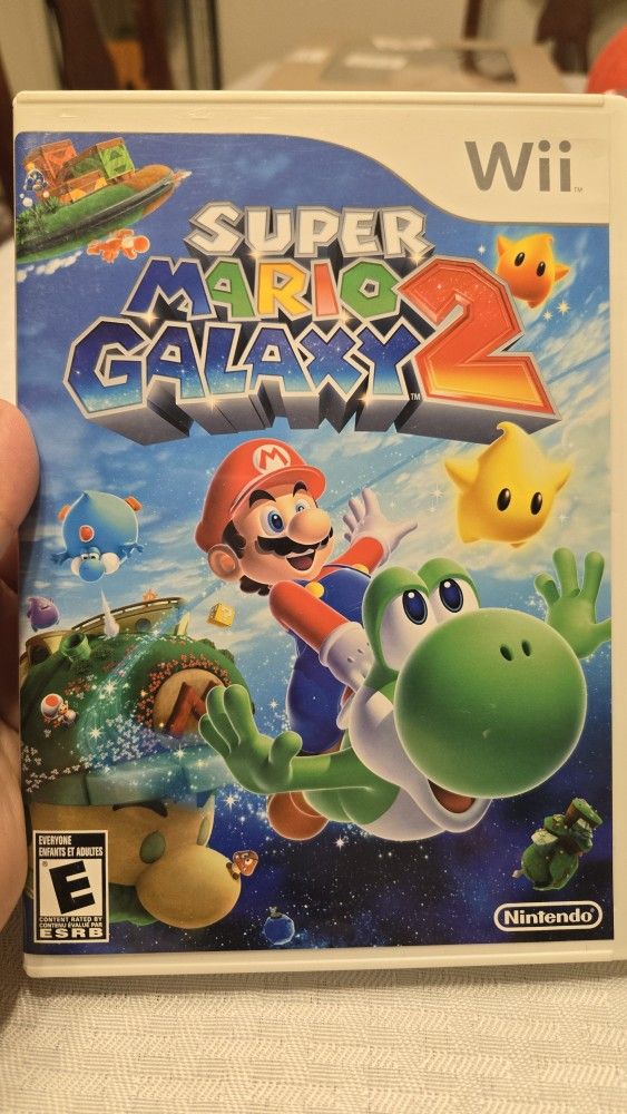 Wii Super Mario Galaxy 2 video game used, shows wear from use. 