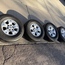 Toyota Tacoma factory OEM wheels Bridgestone tires alloy rims TPMS