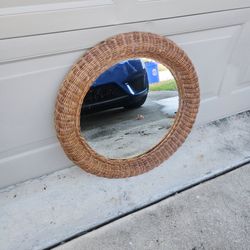 WICKER FRAMED MIRROR  23IN WIDE