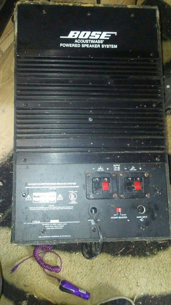 Bose Acoustimass powered speaker system model 2683 plus four twelves.