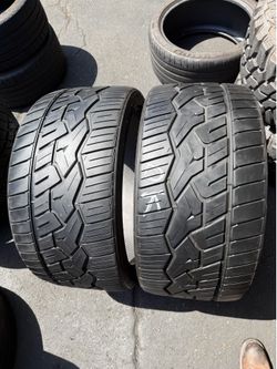 2 tires 315-30-22 nitto $140 for both mounted and balanced