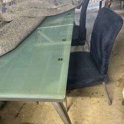 Beautiful Strong Metal Table With 4 Velvet Blue  Chairs Asking $200.  Chairs 