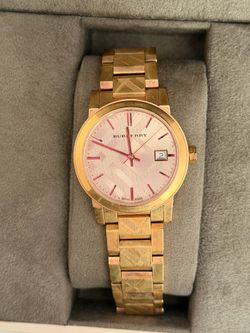 Brand new women’s rose gold Burberry watch