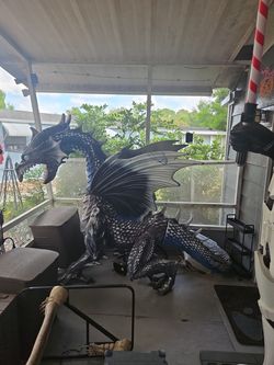 Huge dragon works with fogging machine and he also roars fog machine