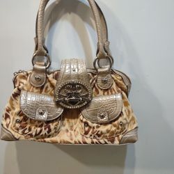 Kathy van zeeland cheetah purse online