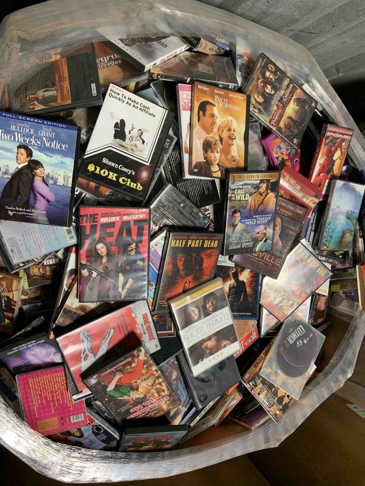 $1.50 ANY ITEM!! DVD and Textbook liquidation C