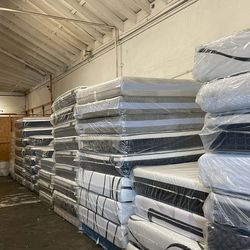 King Size Mattress Pillow Top 12"     new Mattress in a plastic.     We offer same day delivery