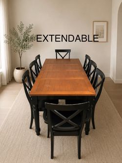 Extendable dining set