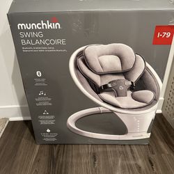 New munchkin baby swing