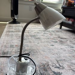 Small lamp with fresh bulb, storage and outlet