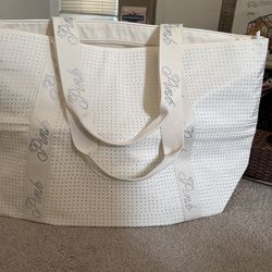 White Victoria’s Secret pink traveling bag