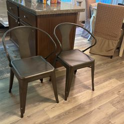 Set Of Four Metal dining chairs