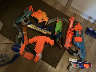 Mixture of Nerf guns & lots of bullets ( All of them for $20 )