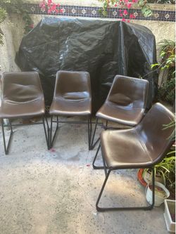 4 leather and metal chairs