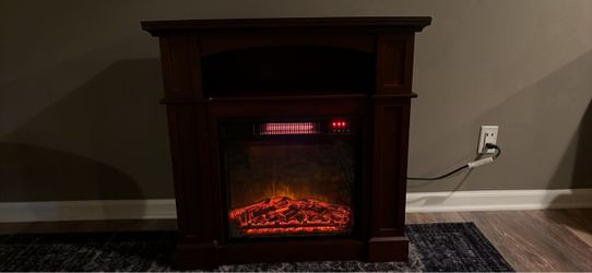 Wooden fireplace heater