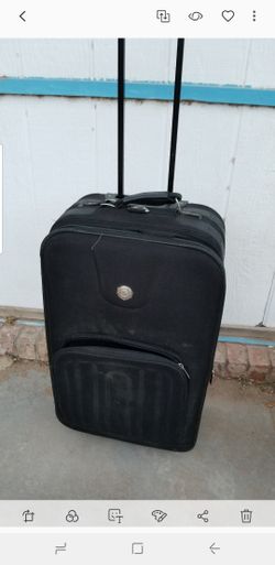 GREAT SUIT CASE WITH WHEELS AND PULL HAND