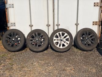 4 Aftermarket rims and tires (Used)