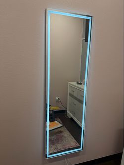 Mirror with inner changeable light color