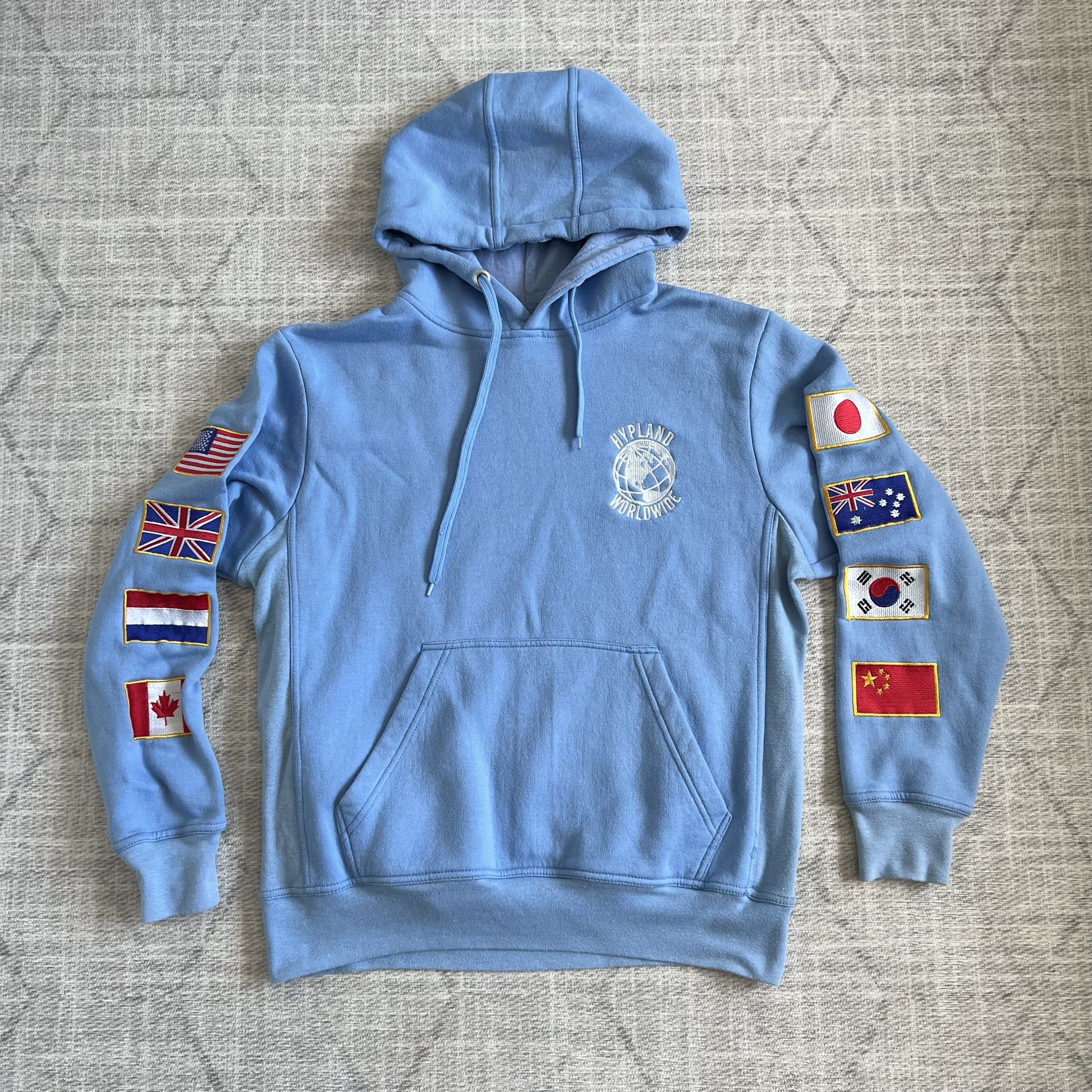 Hypland Worldwide Flags Sewn Logo Men’s Baby Blue Pullover Hoodie