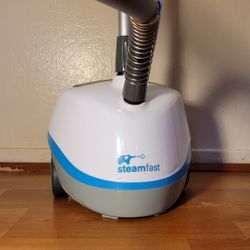 Garment Steamer with Insulated Hose, Clothes Hanger, and Fabric Brush, for long life of your expensive fabric, great condition. $15