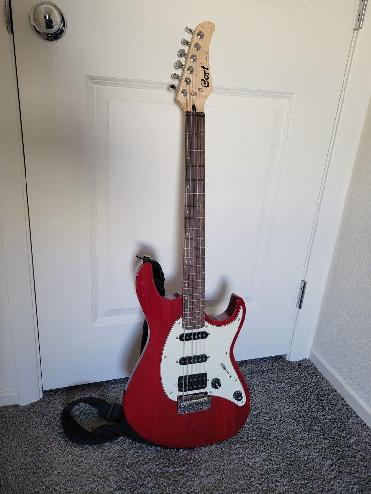 Cort G210 Electric Guitar, Along with Amp, Case, And Music Stand