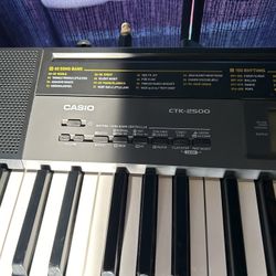 Casio, keyboard with stand