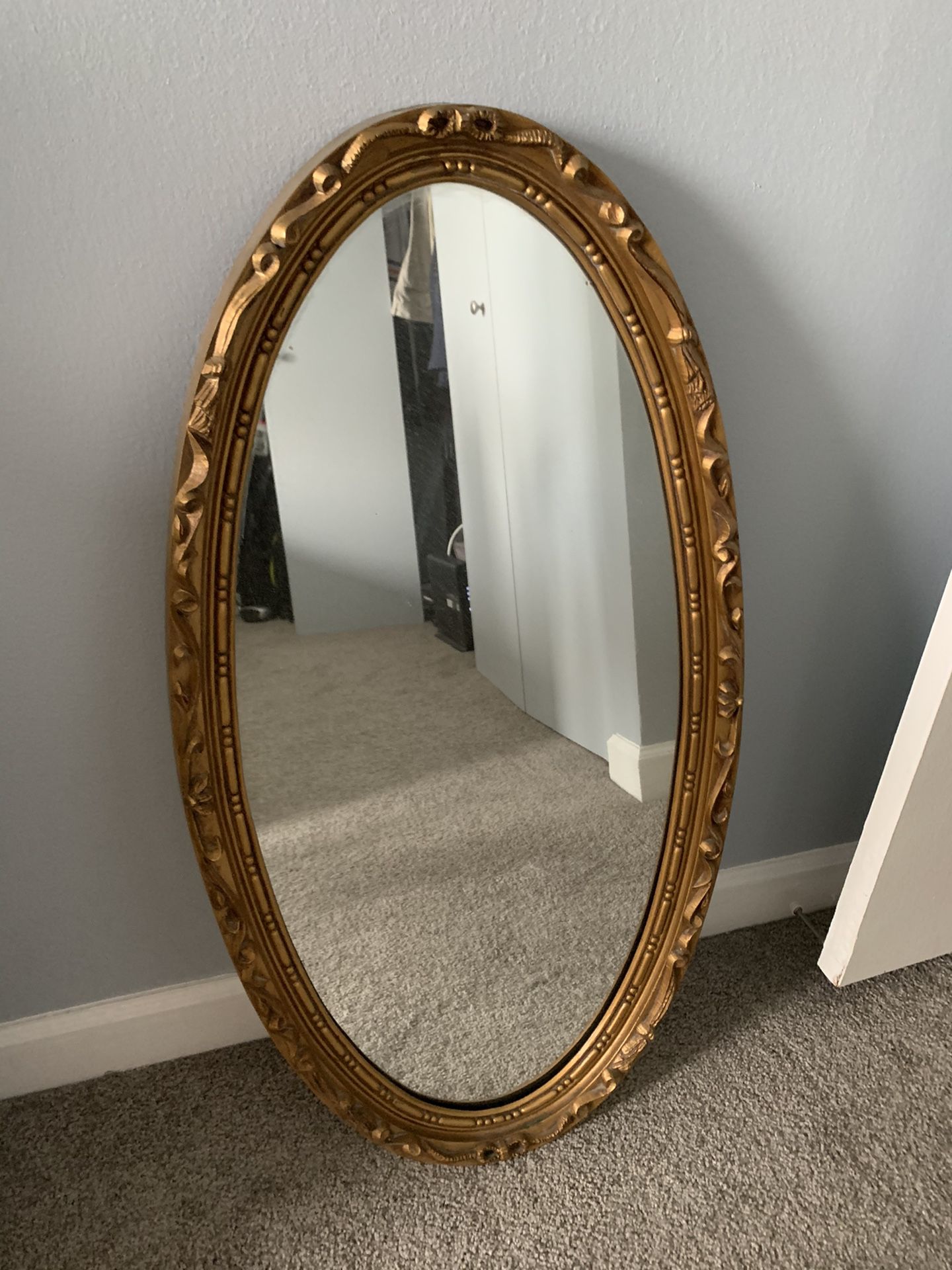 Gold wall mirror