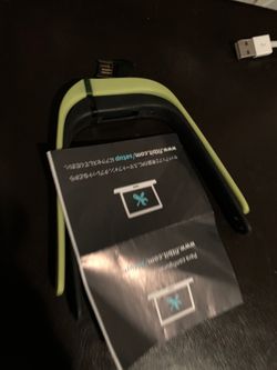 2 Fitbit Flex bands and dogle