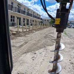Bobcat And Excavator 