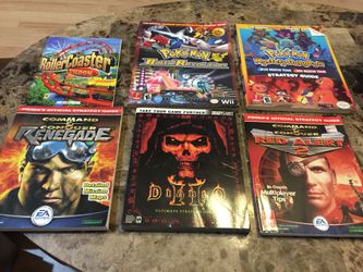 Pokemon strategy guide lot plus Star Wars VHS trilogy.