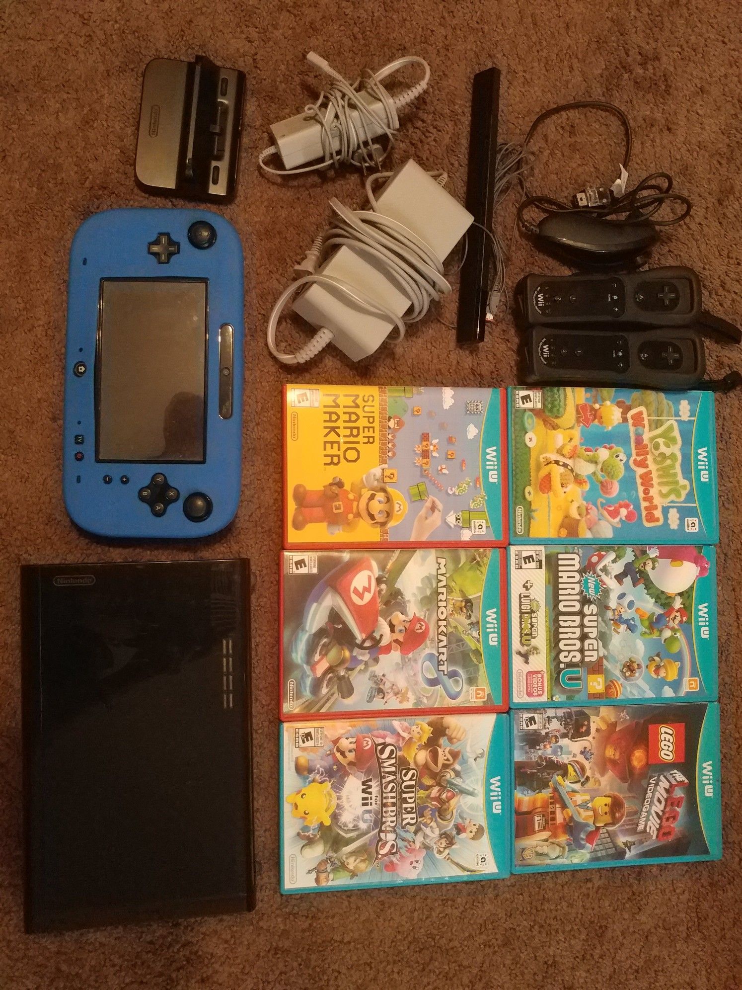 Nintendo Wii U Black Console 32GB Bundle + 6 Games, 3 controllers + a nunchuck & all controllers with covers.