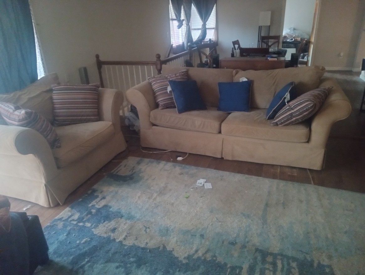 TWO COUCH SETS BOTH OF THEM NEEDS TO BE CLEANED