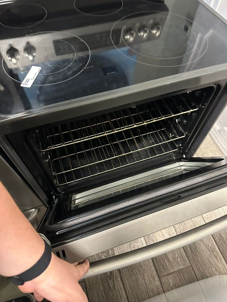Whirlpool off white electric stove usedGe profile slate electric stove glass top used with warranty