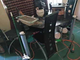 Glass table with 4 chairs