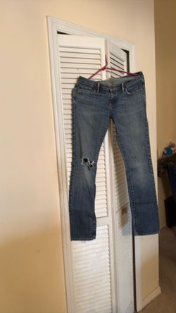 Distressed Low-Rise Bootcut Jeans