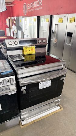 ELECTRIC STOVE, BRAND NEW WITH A TWO YEAR WARRANTY