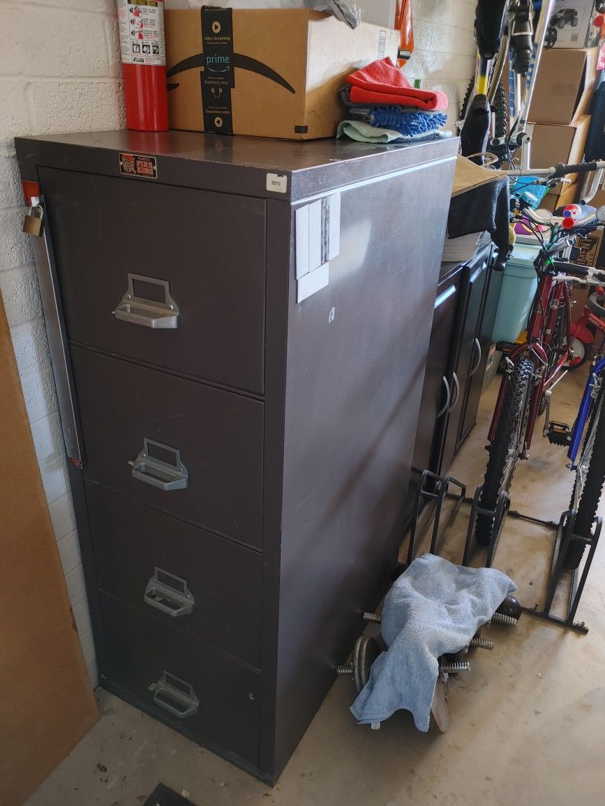 LAST CHANCE- All items make reasonable offers,
4 drawer file cabinet safe, water proof, fire proof, with swivel lock system,
black desk,
Sony CD pl
