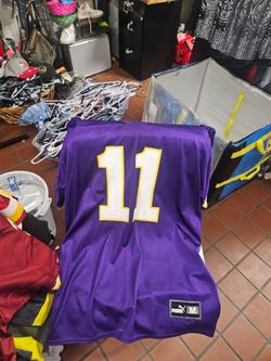 Its a vikings jersey #11 .