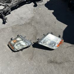 2005-2012 Nissan pathfinder left driver headlight $120 right passenger headlight $120