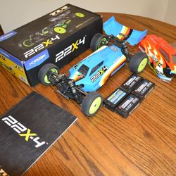 TLR 22X-4 4wd Competion Buggy Ready to Race with 4 batteries