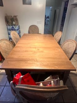 Wood Dining Table with 6 Cane Chairs