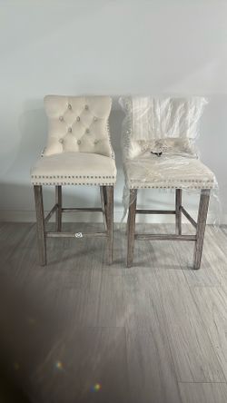 Set Of Two Velvet High stools.