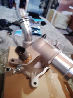 New coolant manifold with temp sensor
