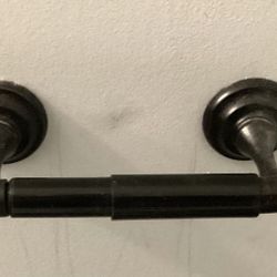 Bronze bathroom wall fixtures.