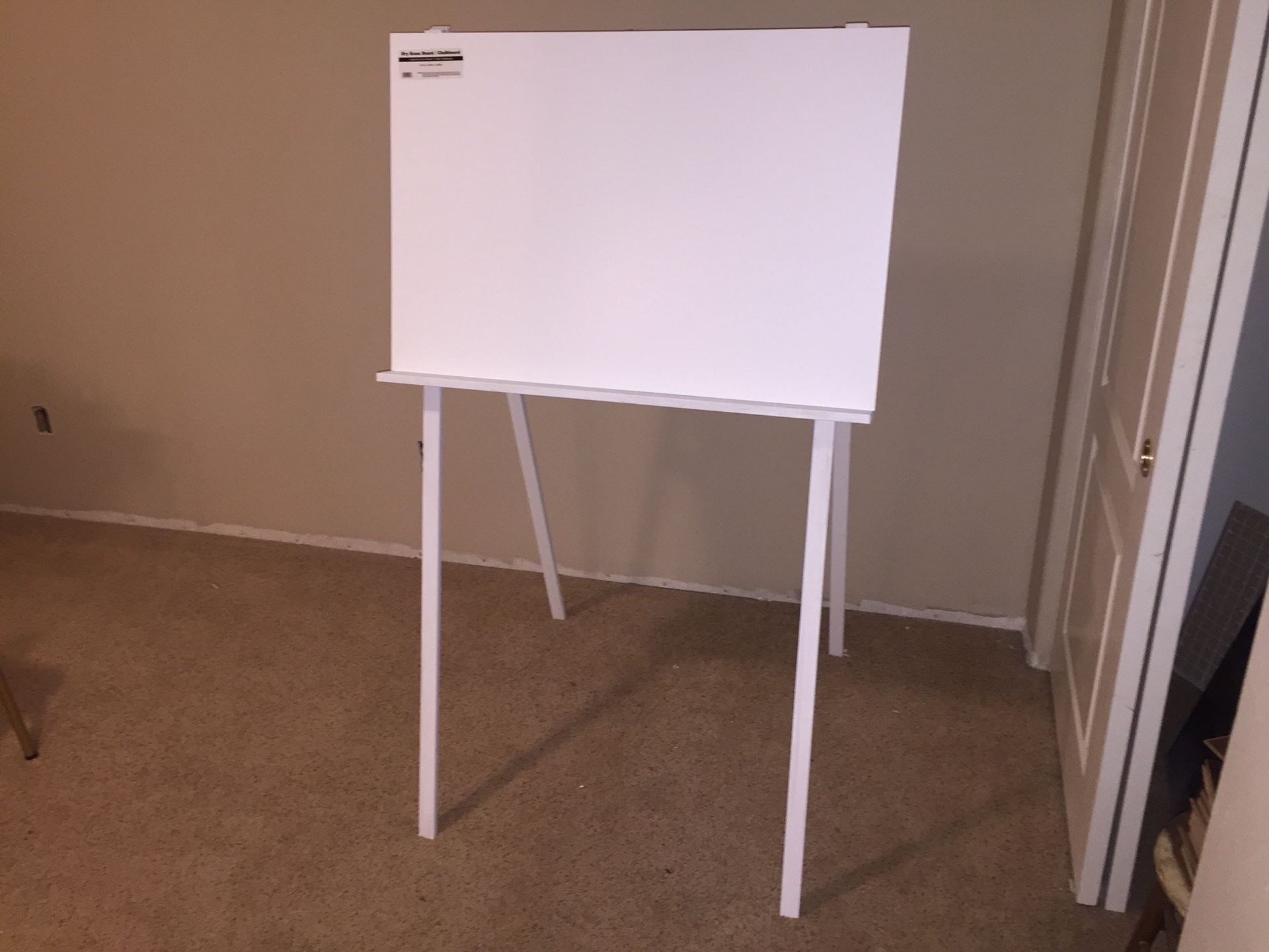 60” tall Easel with 36” x 24” dry erase board.