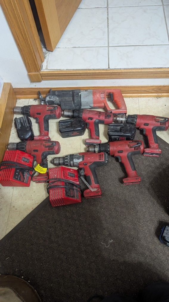 Milwaukee V18 not M18 
(6)Hammer Drills work good
(1) Sawzall works good
(3) Good batteries
(2) Chargers
(5) Bad batteries
$150 for all
