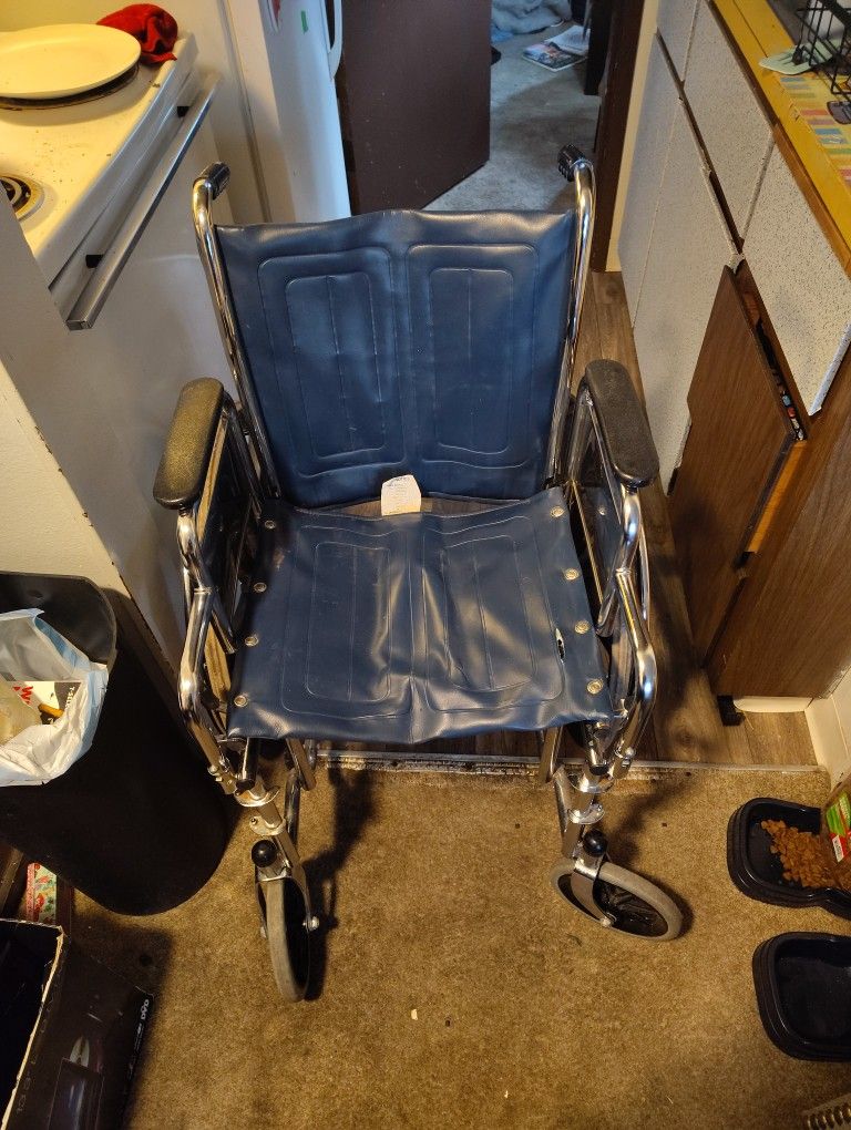 Blue Invacare Wheelcair