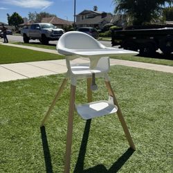 White And Wooden Baby High Chair 
